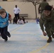 U.S. Marines with SPMAGTF-CR-AF LCE 18.2 help Sigonella Elementary School children ‘overcome obstacles’