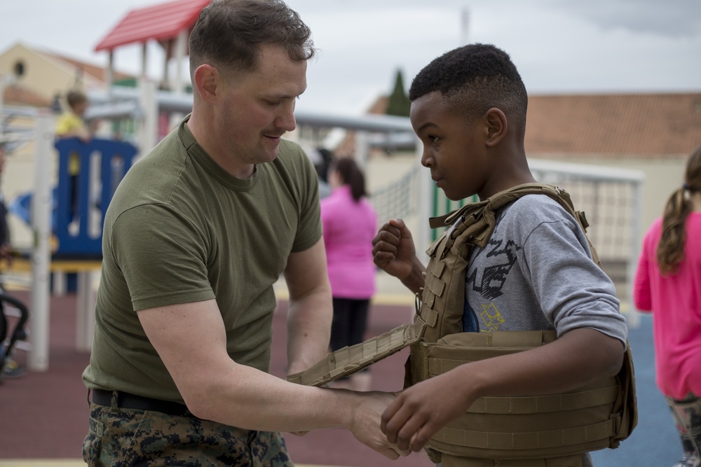 U.S. Marines with SPMAGTF-CR-AF LCE 18.2 help Sigonella Elementary School children ‘overcome obstacles’