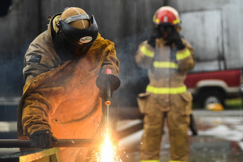 Sailors Assigned to USS Nimitz &amp; USS Momsen Conduct Firefighting Training