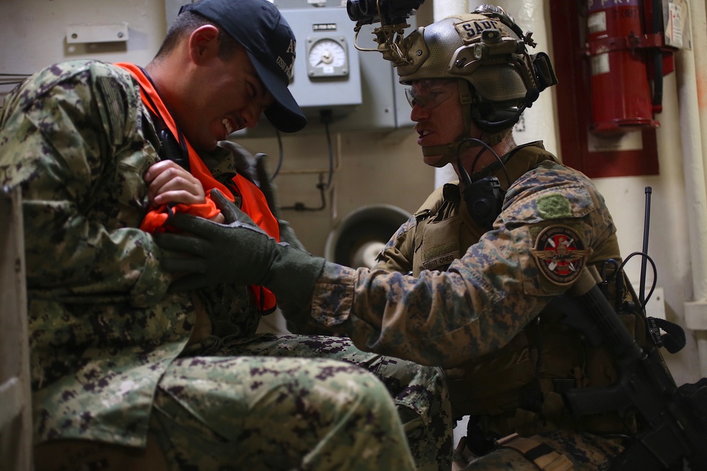 U.S. Marines with 3rd Reconnaissance Battalion conduct visit, board, search and seizure training with British Royal Marines, U.S. Sailors