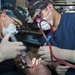 GHWB Dental Officer Performs Oral Surgery