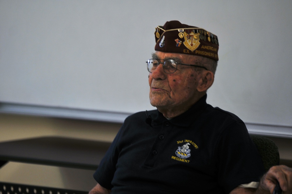 Chief Master Sgt. (Ret.) speaks during the 2018 Bataan Memorial Death March