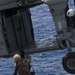 Recon Marines fast rope from an MH-60S aboard the USS Wasp