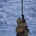 Recon Marines fast rope from an MH-60S aboard the USS Wasp
