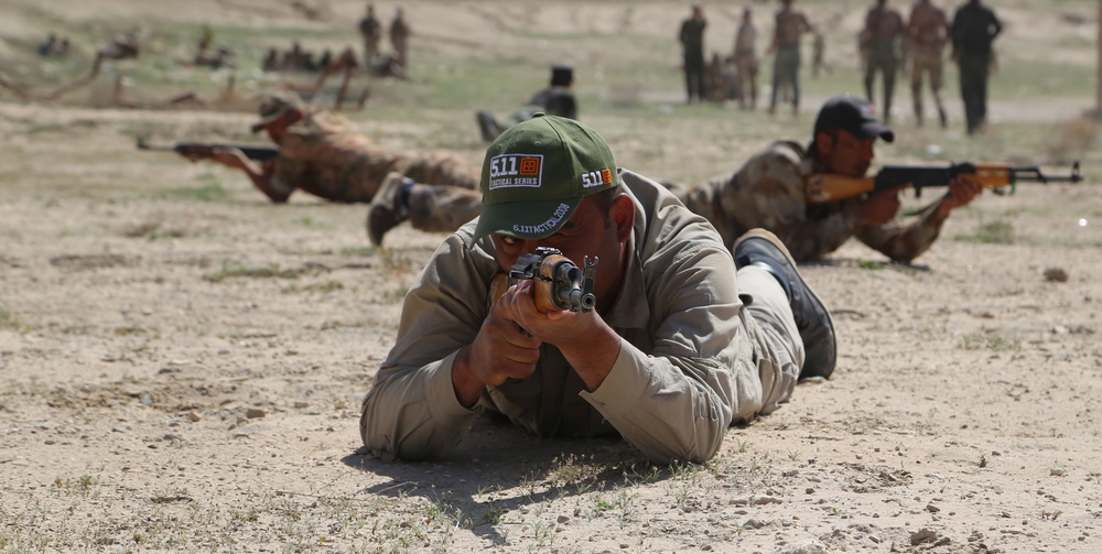 Iraqi security forces conduct fire team training