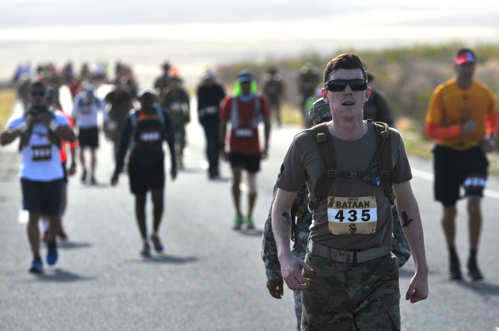 Marathon participants in the 2018 Bataan Memorial Death March endure exhaustion