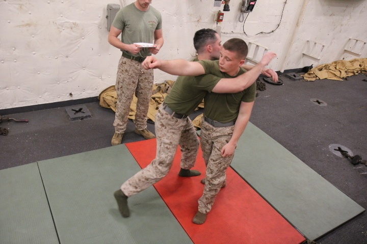 Ground Combat Element conducts MCMAP abord USS New York