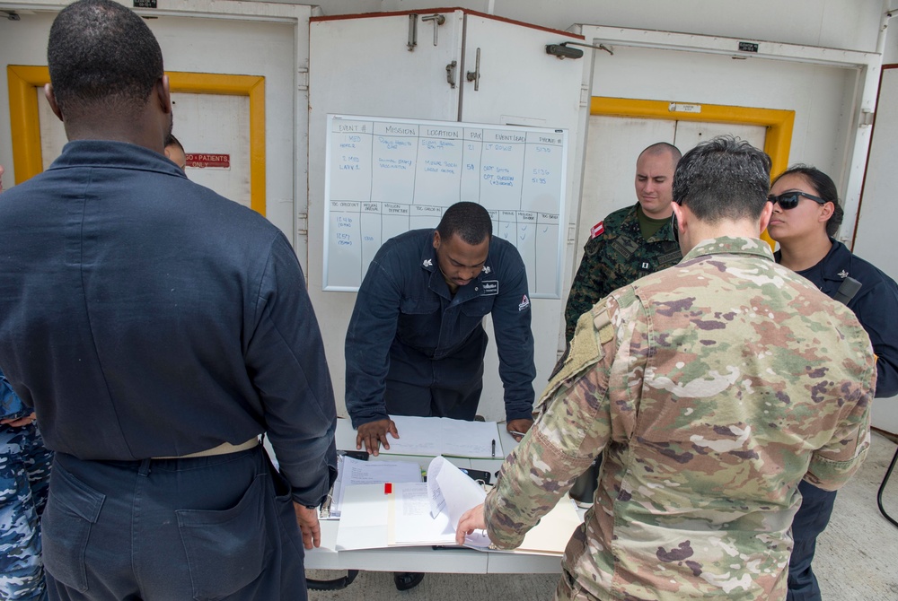 Service members conduct field training exercise aboard USNS Mercy