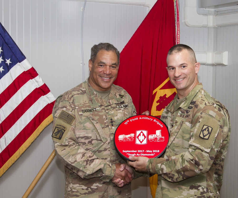 Lieutenant Gen. Garrett receives gift during visit to UAE