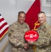 Lieutenant Gen. Garrett receives gift during visit to UAE