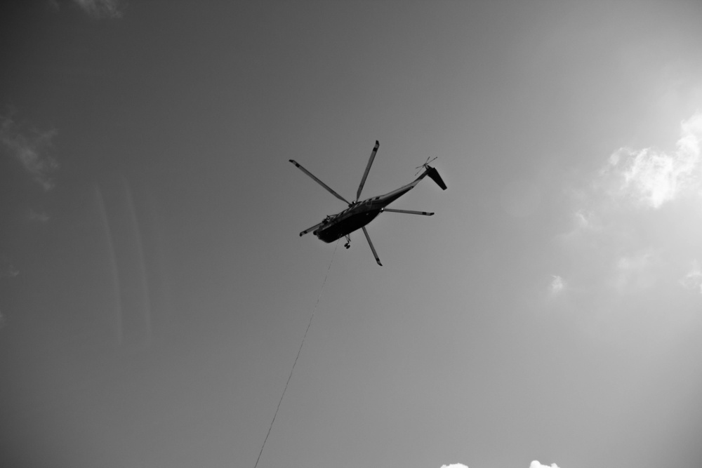 Helicopter operations at a laydown yard in Las Piedras