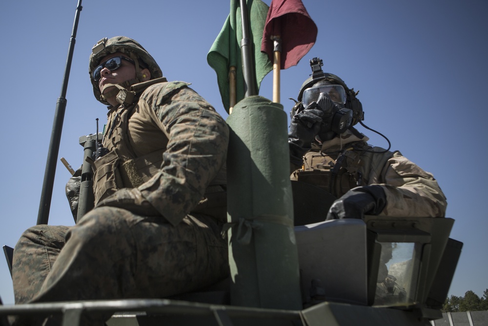 Attack through the gas: Marines of 2nd LAR perform live-fire range in full MOPP