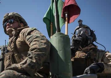 Attack through the gas: Marines of 2nd LAR perform live-fire range in full MOPP