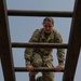 Soldier Completes Obstacle Course