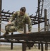 Soldier Completes Obstacle Course