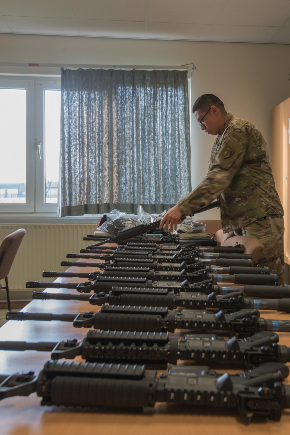 UK/US training with M4, M9, Glock, and SA80