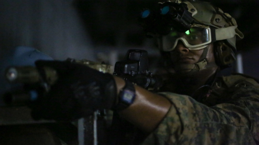 U.S. Marines with 3rd Reconnaissance Battalion conduct simulated maritime operations with British Royal Marines, U.S. Sailors in Guam