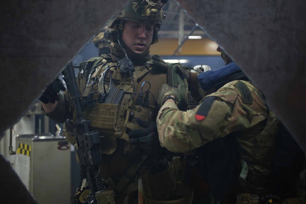 U.S. Marines with 3rd Reconnaissance Battalion conduct simulated maritime operations with British Royal Marines, U.S. Sailors in Guam