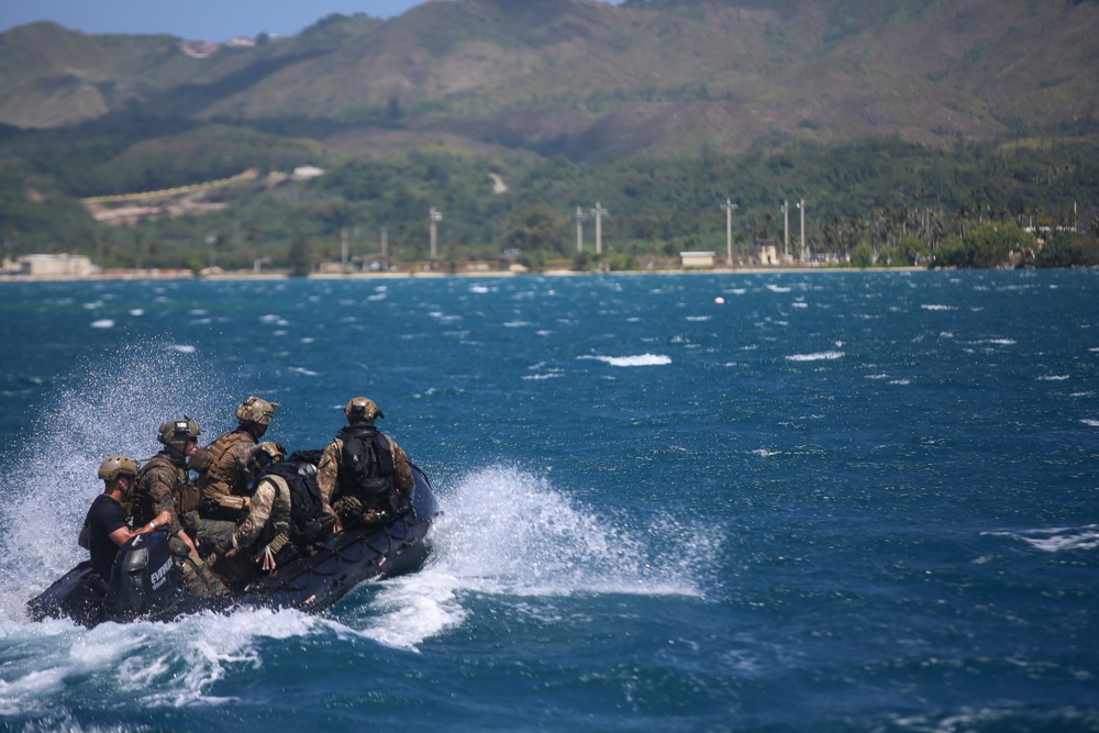 U.S. Marines with 3rd Reconnaissance Battalion conduct simulated maritime operations with British Royal Marines, U.S. Sailors in Guam