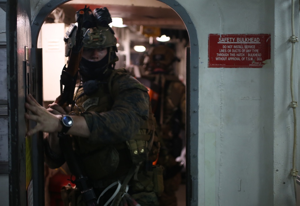 U.S. Marines with 3rd Reconnaissance Battalion conduct simulated maritime operations with British Royal Marines, U.S. Sailors in Guam