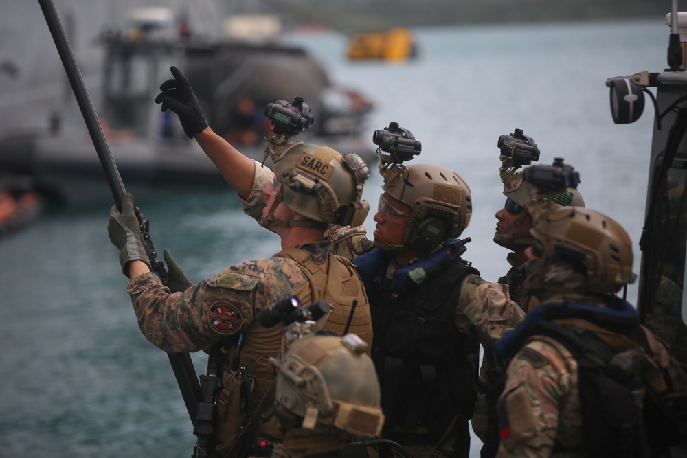 U.S. Marines with 3rd Reconnaissance Battalion conduct simulated maritime operations with British Royal Marines, U.S. Sailors in Guam