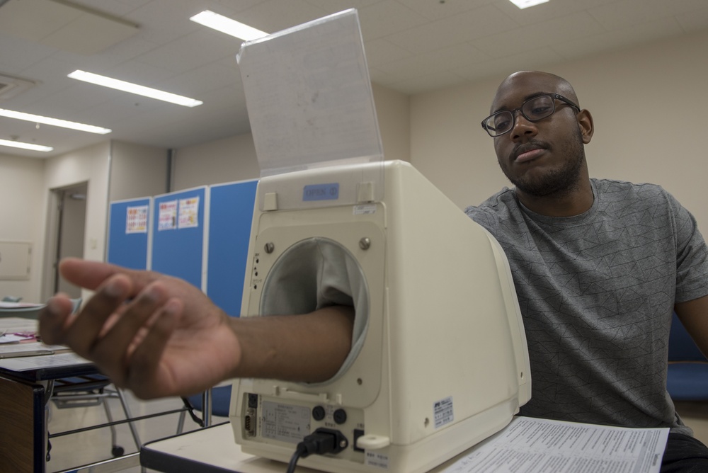 Members of Team Yokota donate blood to JRCS