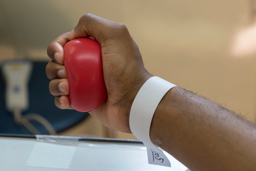 Members of Team Yokota donate blood to JRCS