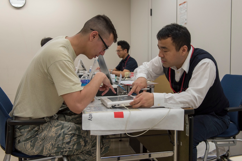 Members of Team Yokota donate blood to JRCS