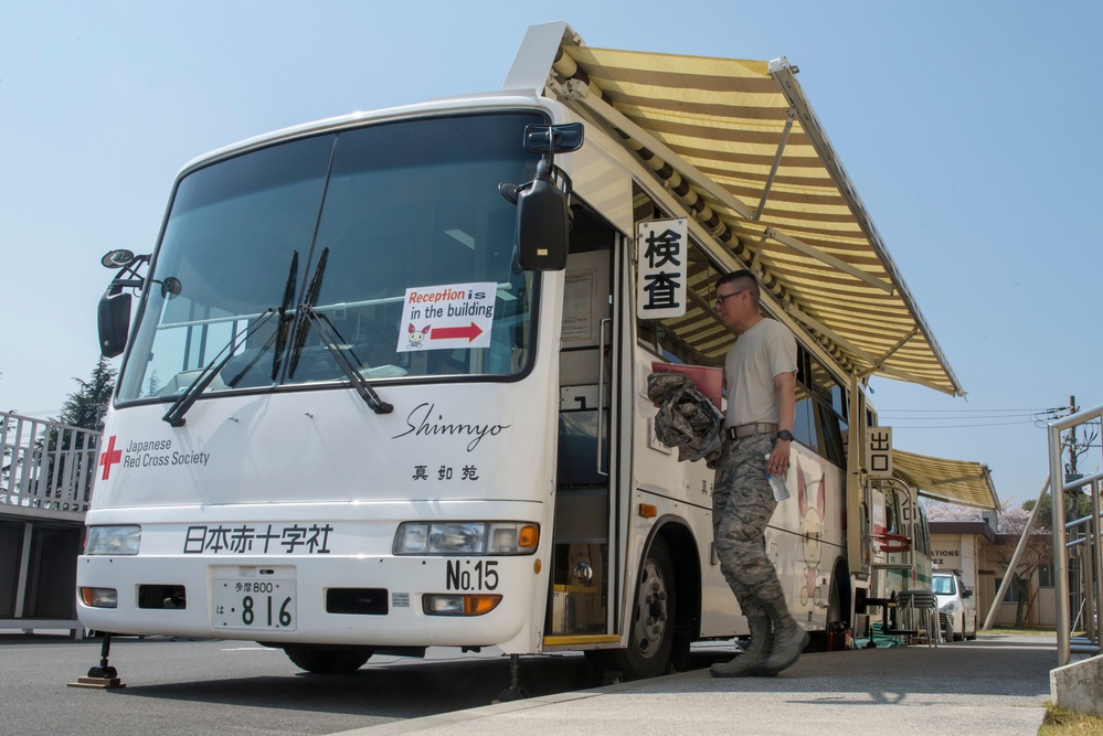 Members of Team Yokota donate blood to JRCS