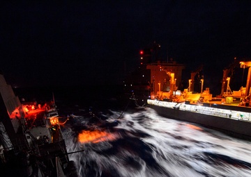 USS Mustin conducts replenishment-at-sea (RAS) with USNS Walter S. Dehl