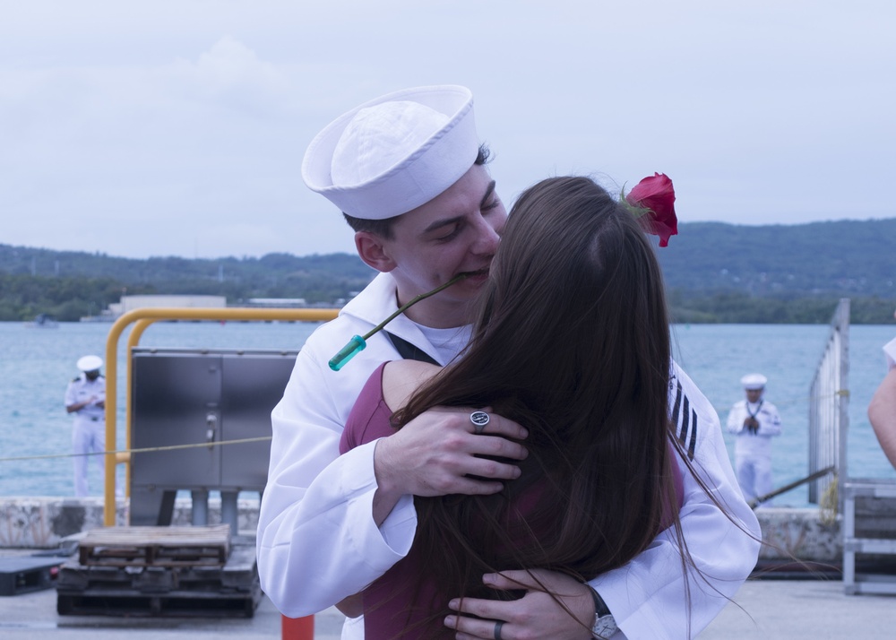 Sailors Greets Wife with Rose During Homecoming