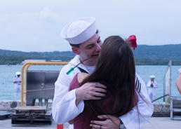 Sailors Greets Wife with Rose During Homecoming