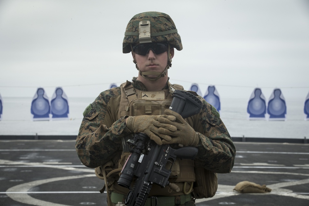 U.S. Marines with BLT 3/1 conduct a live fire deck shoot