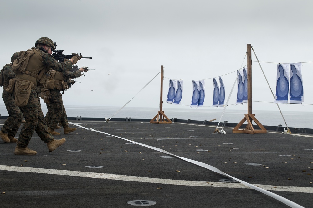 U.S. Marines with BLT 3/1 conduct a live fire deck shoot