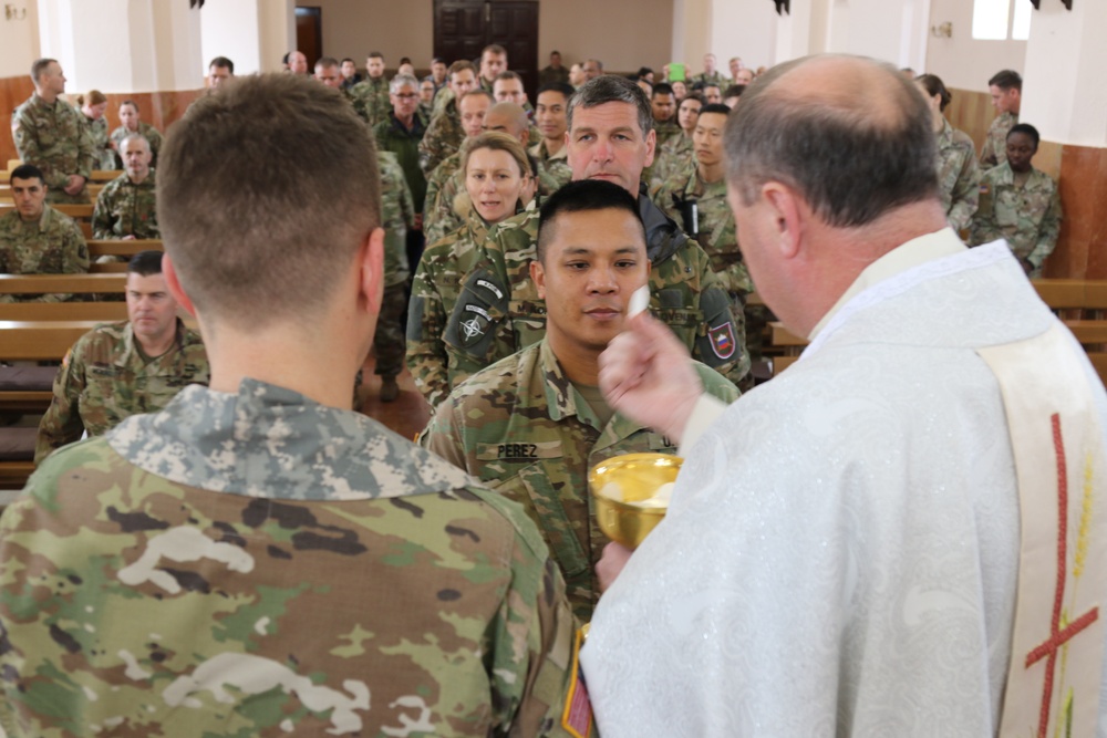 Soldiers celebrate Easter Mass at Church of the Black Madonna