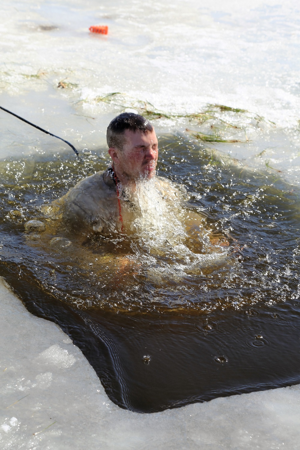 Cold-Weather Operations Course 18-06 students complete cold-water immersion training at Fort McCoy