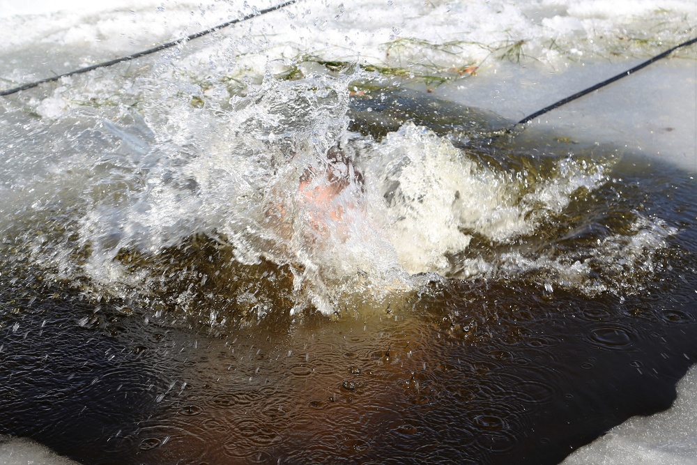 Cold-Weather Operations Course 18-06 students complete cold-water immersion training at Fort McCoy