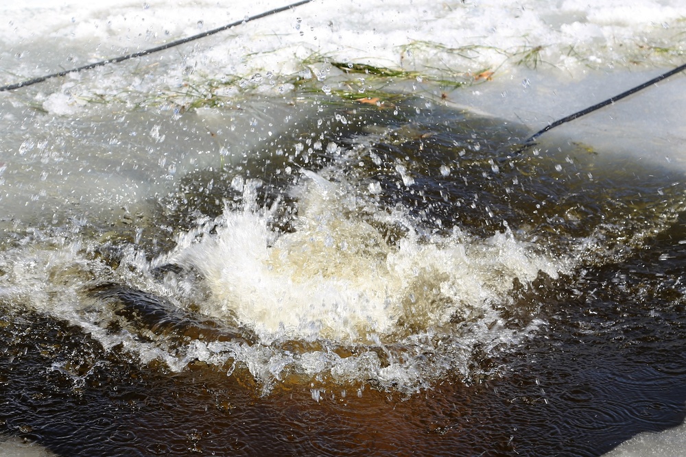 Cold-Weather Operations Course 18-06 students complete cold-water immersion training at Fort McCoy