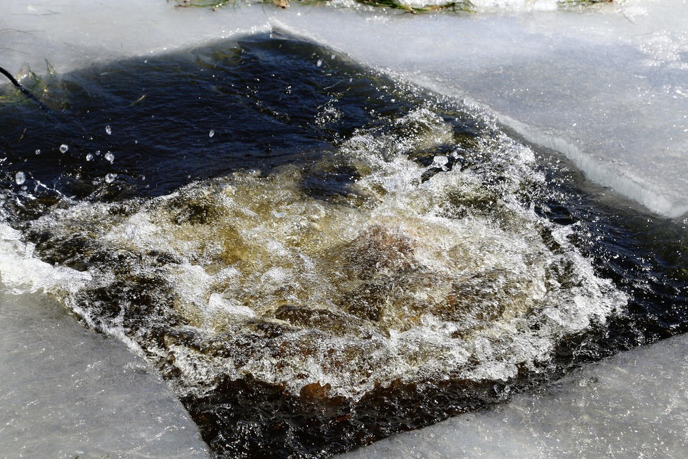 Cold-Weather Operations Course 18-06 students complete cold-water immersion training at Fort McCoy