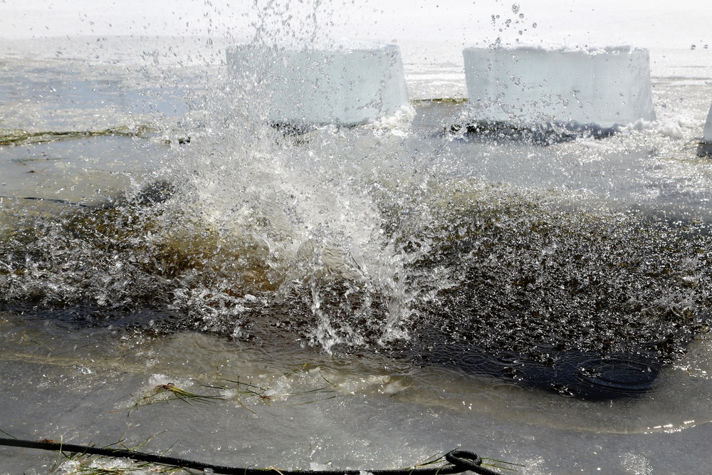Cold-Weather Operations Course 18-06 students complete cold-water immersion training at Fort McCoy