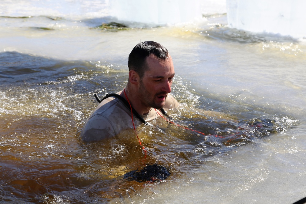 Cold-Weather Operations Course 18-06 students complete cold-water immersion training at Fort McCoy