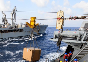 USS Mustin (DDG 89) conducts a replenishment-at-sea with USNS Walter S. Diehl (T-AO-193)