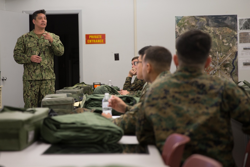 CBRN Marine Undergo Aircraft Equipment Training