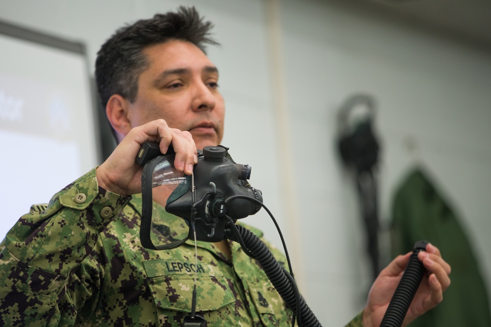 CBRN Marine Undergo Aircraft Equipment Training