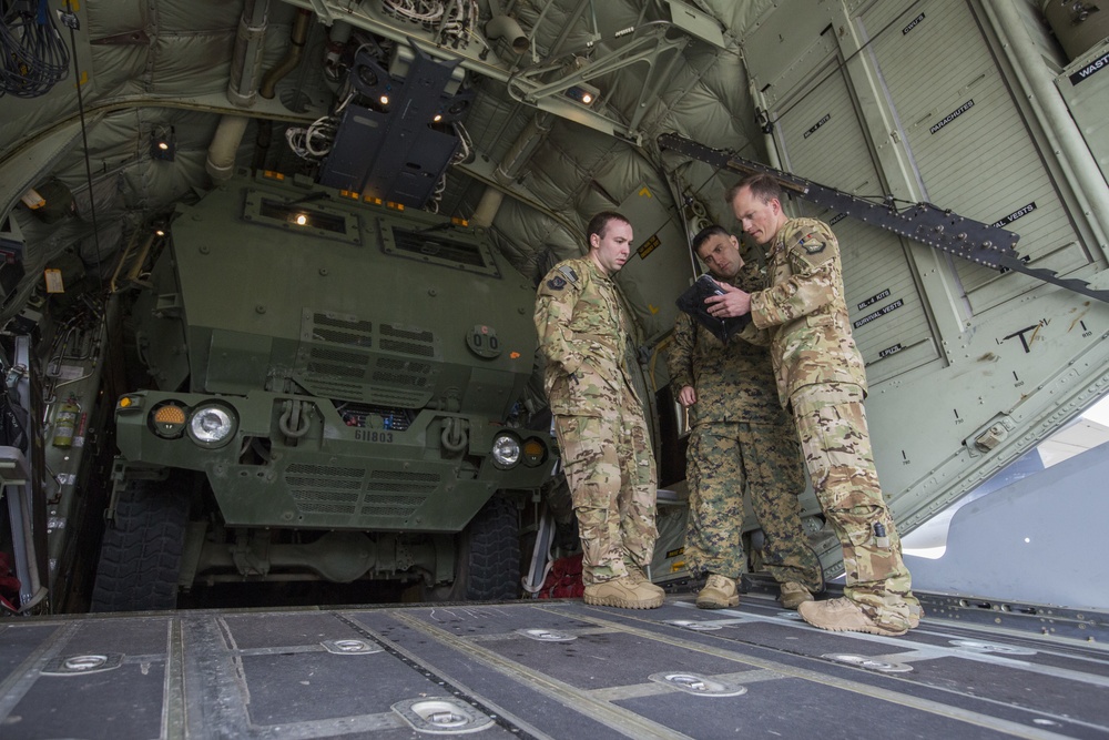 Marines with 2/14 conduct a live-fire HIMARS raid