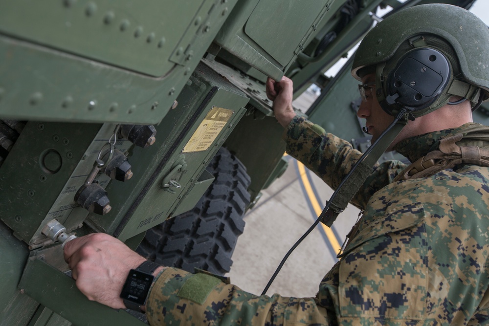 Marines with 2/14 conduct a live-fire HIMARS raid