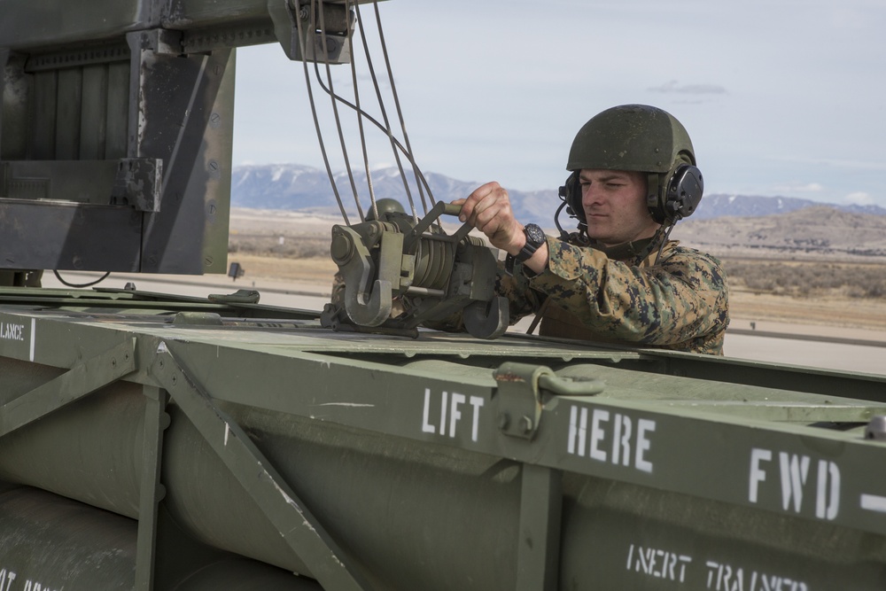 Marines with 2/14 conduct a live-fire HIMARS raid