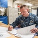 USS America Sailor reviews monthly maintenance plan