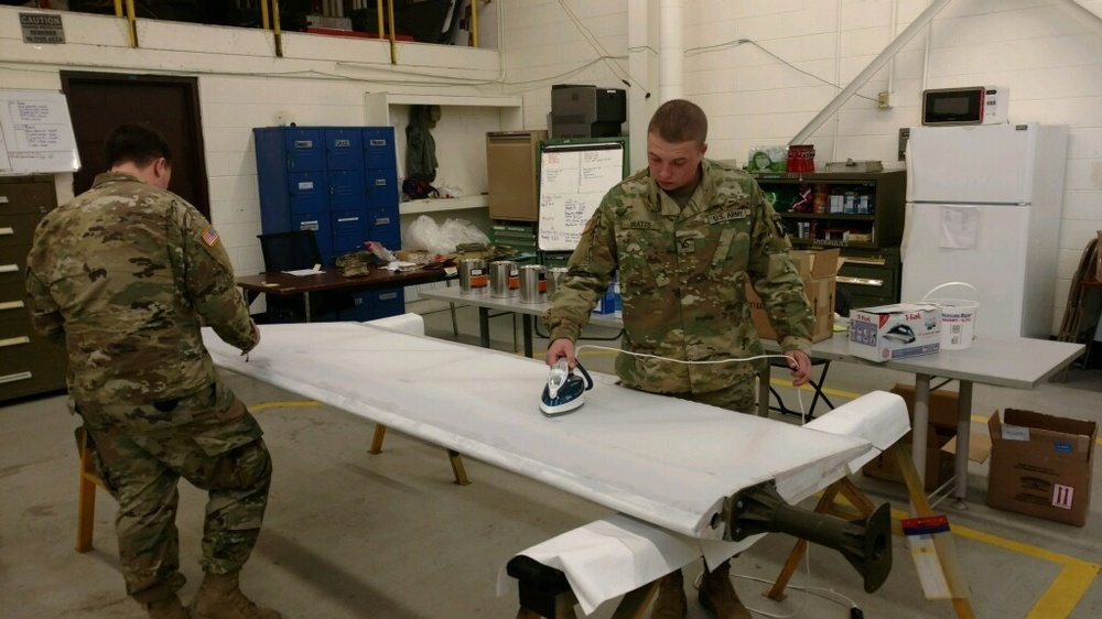 Soldiers Repair World War II-Era Glider