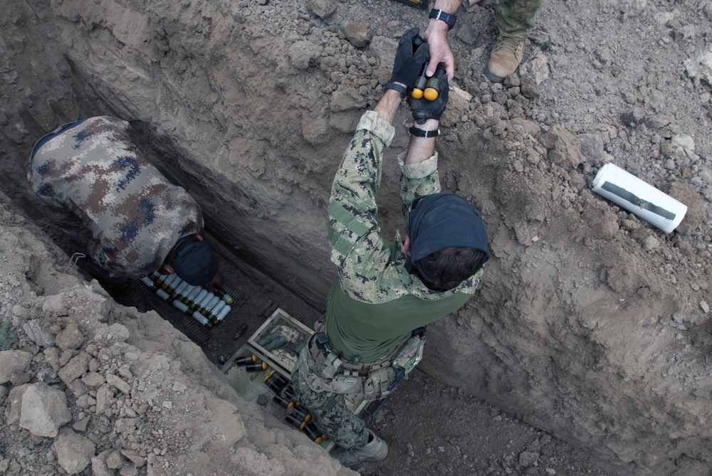 EOD burying explosives